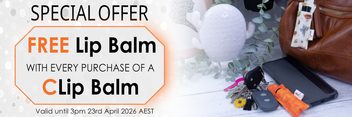 A promotional banner that has a photo on the right showing a set of keys next to a phone.  Attached to the keys is an orange Clip Balm with a lip balm inside.  Beside this is a bag that has another Clip Balm with lip balm tube hanging on the bag.  To the left of the photo are words promoting a Special Offer of a Free Lip Balm with a purchase of a Clip Balm.  Below it advises the offer ends 3pm 23rd April   AEST
