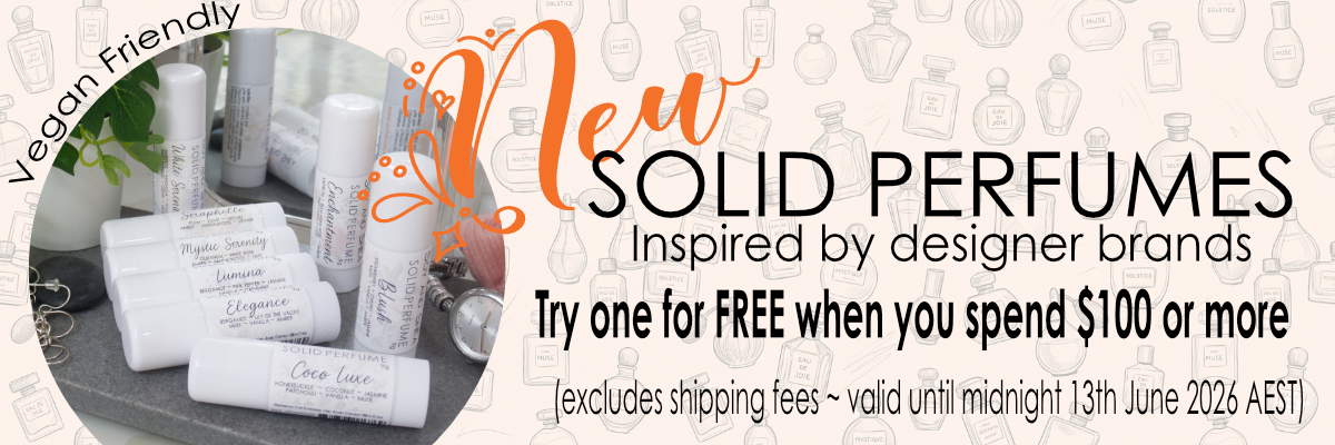 A promotional banner introducing new Solid Perfumes with a special to receive one free when spending over $100.  The banner has an image of the eight new solid perfumes in white wind -up tubes.