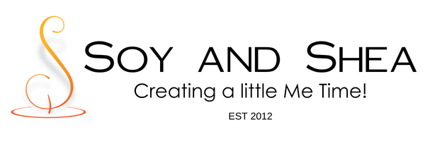 Soy and Shea logo banner with a stylised orange “S” icon, the text “Soy and Shea,” the tagline “Creating a little Me Time!” and “EST 2012” on a white background.