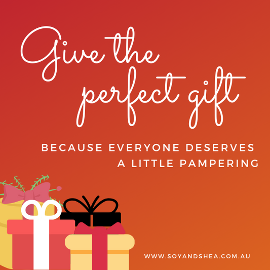 Electronic gift card  advertisement with "Give the perfect Gift" in white writing on a red and orange background with illustrations of a gift boxes.